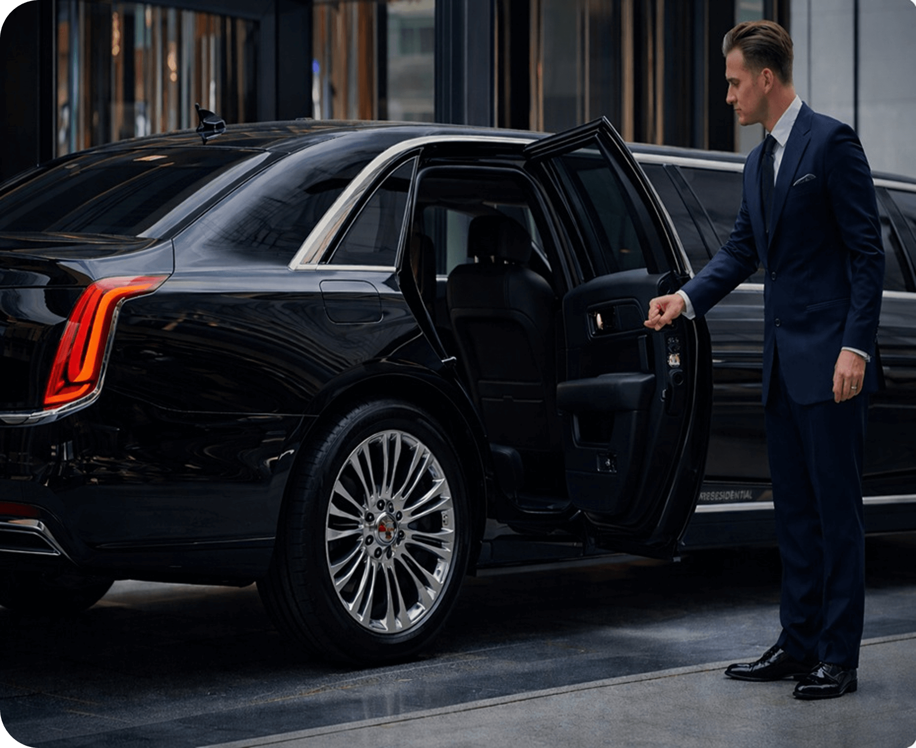 Chauffeur opening gate for his client